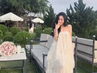Đầm maxi tua rua trắng 
